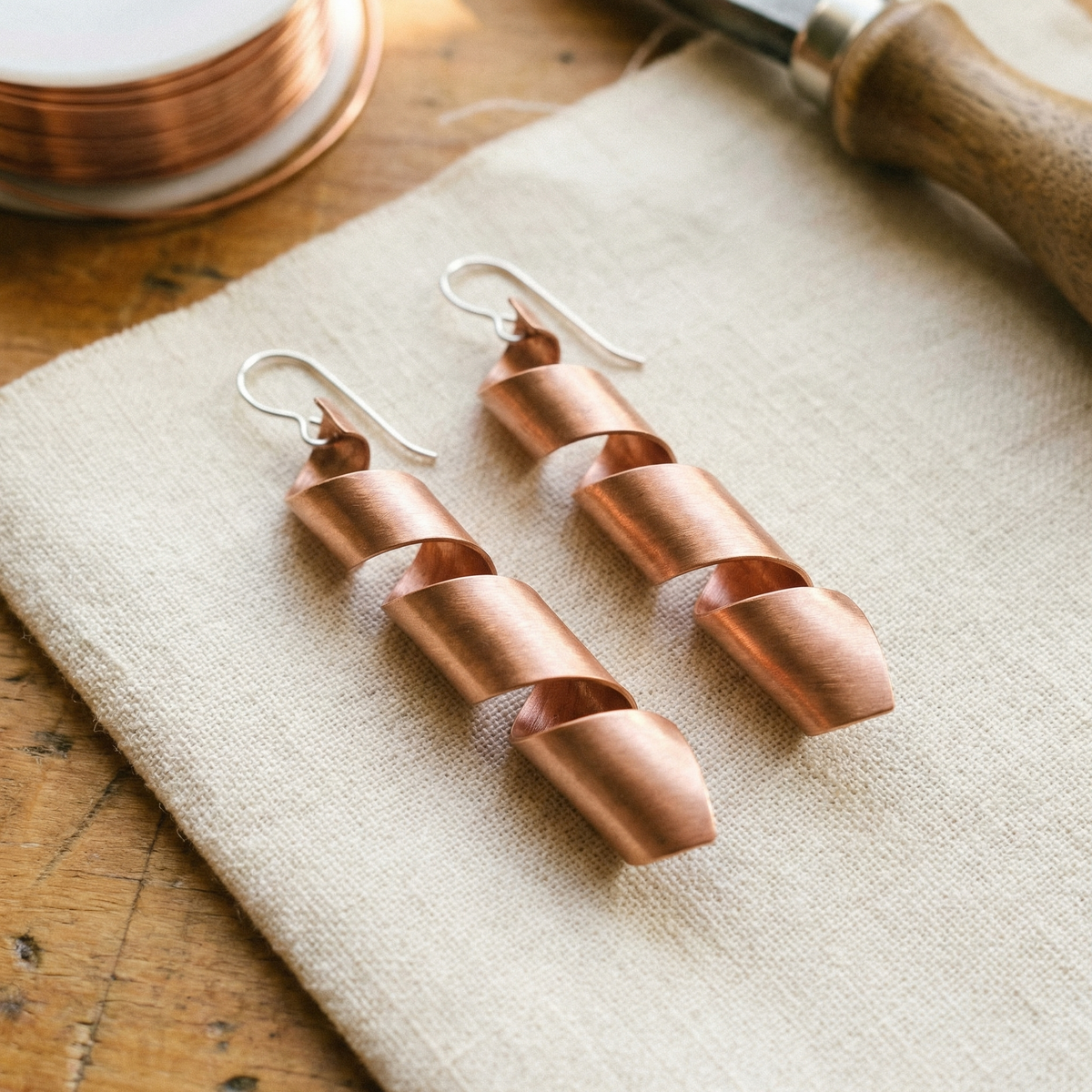 Aretes de cobre Ocaso