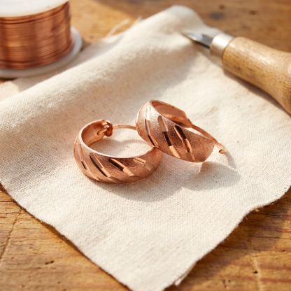 Aretes de cobre Pluma